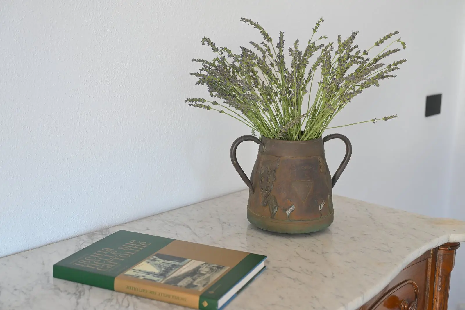 The vase of lavender on the marble of the room
